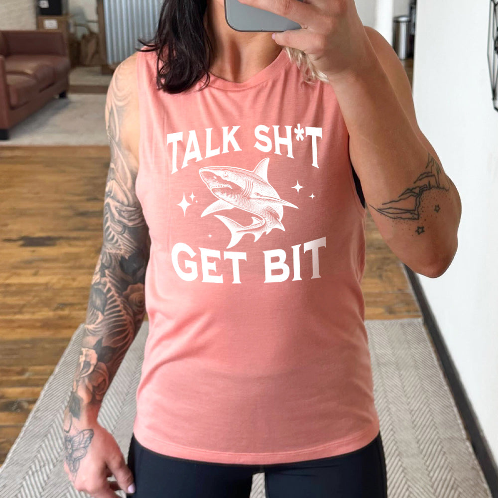 peach muscle tank with a shark graphic on it that says "Talk Shit Get Bit"