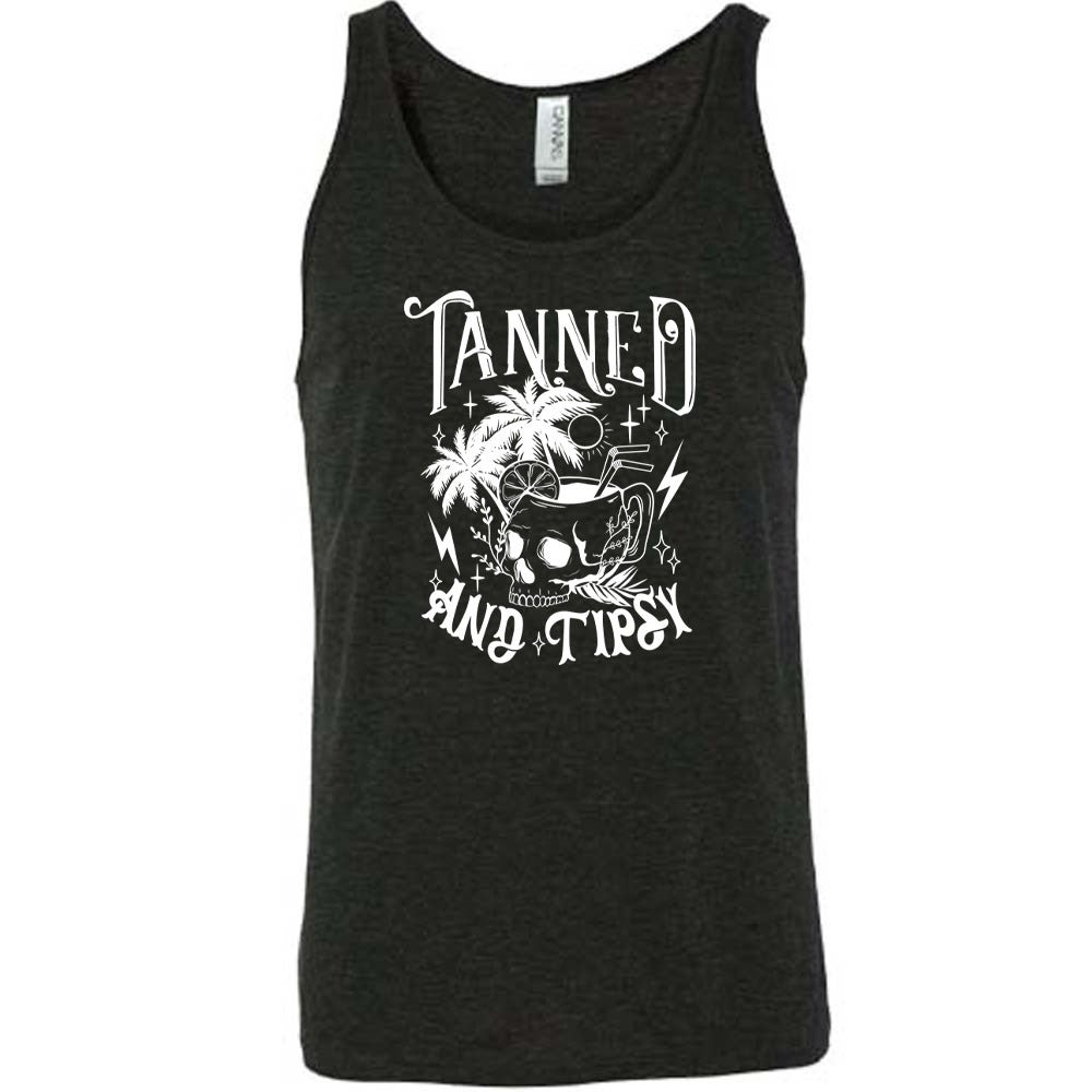 Black colored tank with a drink inside a skull cup graphic on it that says "Tanned and Tipsy"