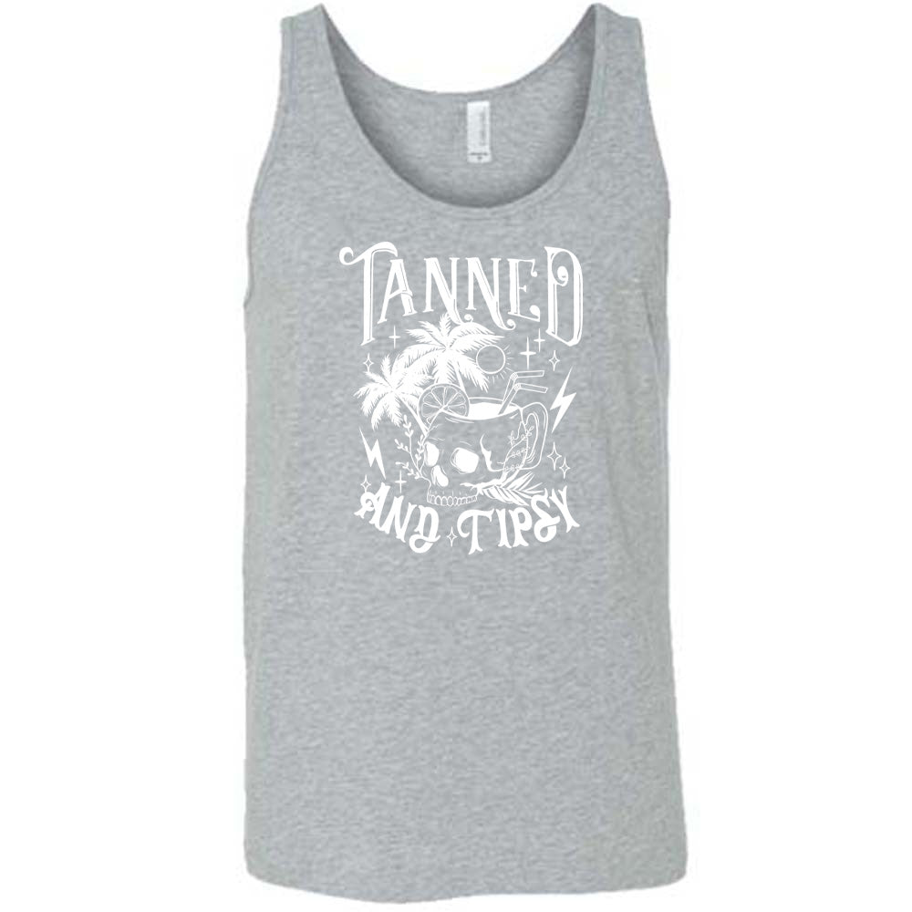 Grey colored tank with a drink inside a skull cup graphic on it that says "Tanned and Tipsy"