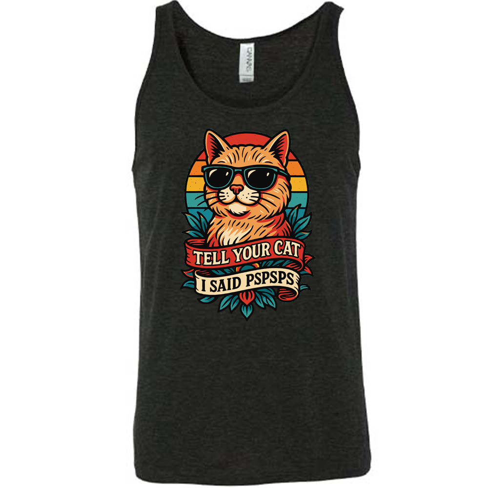 black unisex tank with the large graphic of a cat head and torso, wearing sunglasses, with a colorful background, and two banners below it with the words "tell your cat I said pspsps" on them