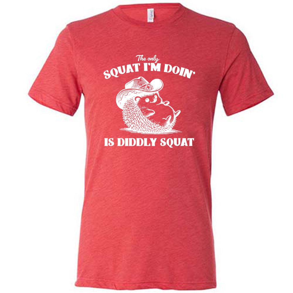 Red colored shirt with a porcupine in a cowboy hat graphic on it that says "The Only Squat I'm Doing Is Diddly Squat"
