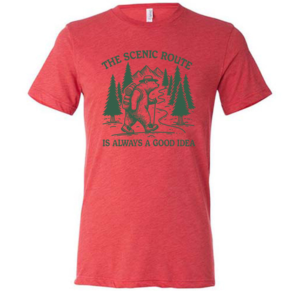 red unisex tee with the words "the scenic route is always a good idea" with a bear hiking on a trail through the woods