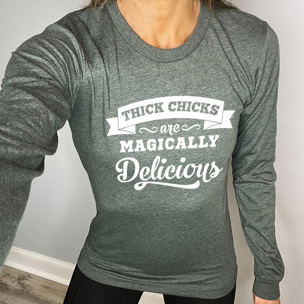 green shirt with the quote "Thick Chicks Are Magically Delicious" on it