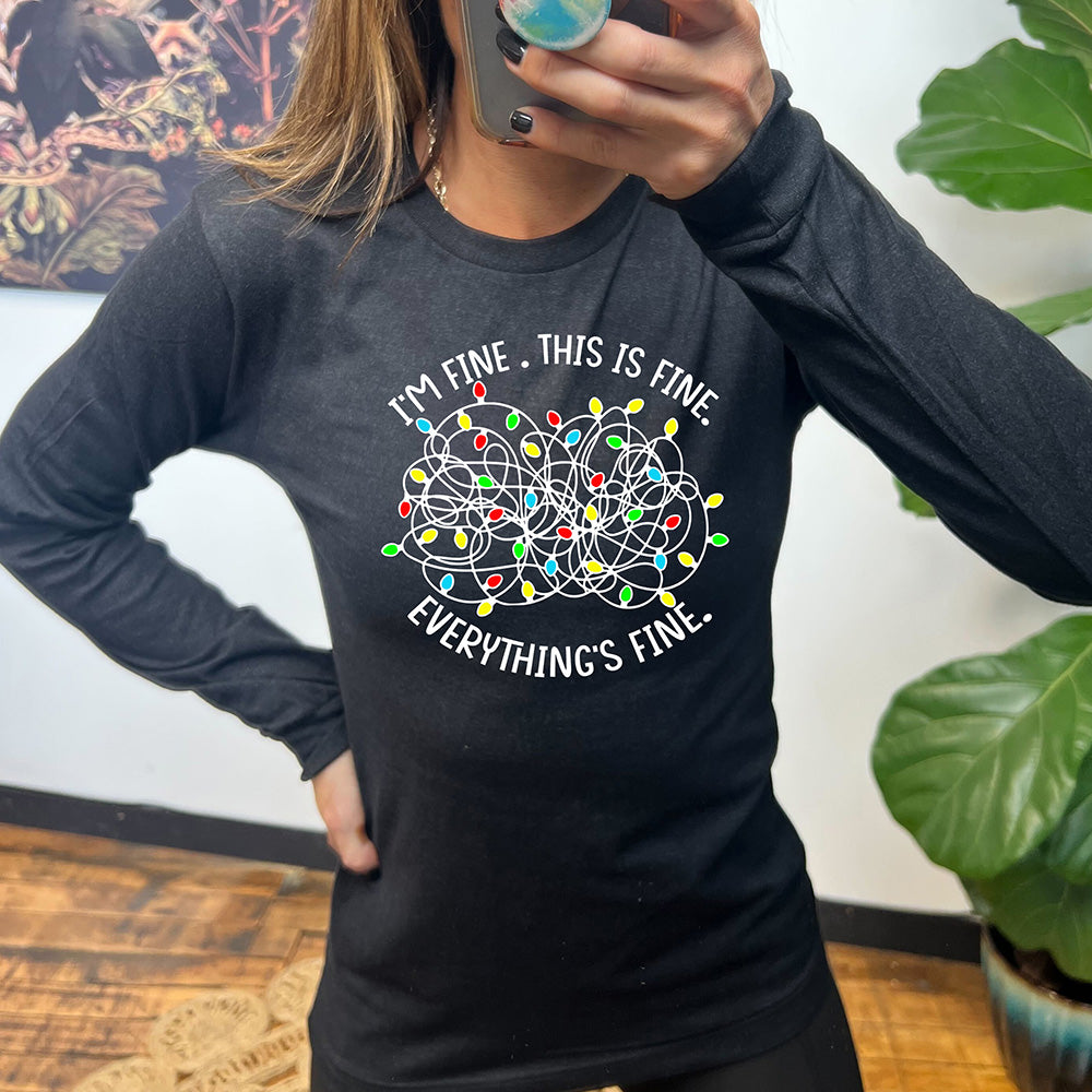 black long sleeve with the text "I'm Fine. This Is Fine. Everything's Fine." on it