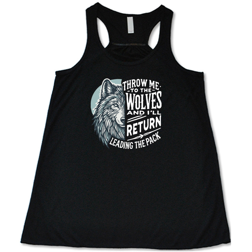 Black colored flowy tank with a wolf face graphic on it that says "Throw Me To The Wolves And I'll Return Leading the Pack"