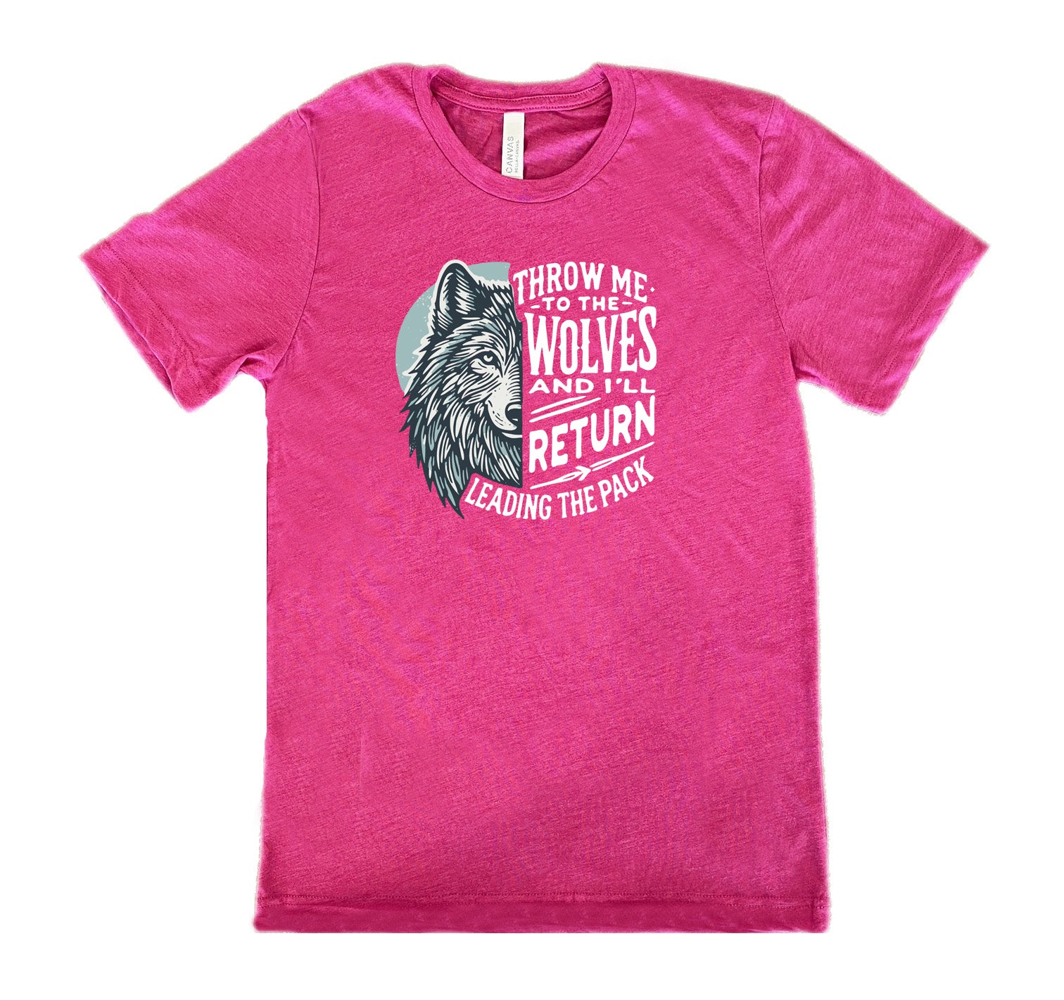 Berry colored shirt with a wolf face graphic on it that says "Throw Me To The Wolves And I'll Return Leading the Pack"