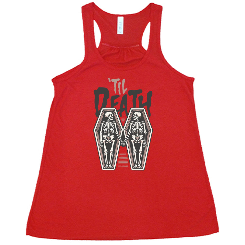 red flowy tank with the words "'til death" on it, with graphics of two skeletons, both in their own coffins, holding hands in the middle