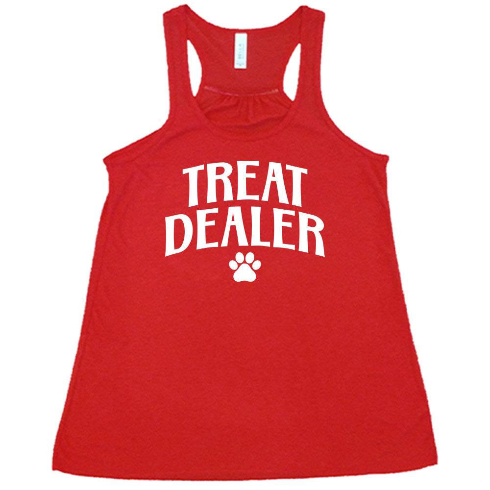 Red colored flowy tank with paw print graphic on it that says "TREAT DEALER"