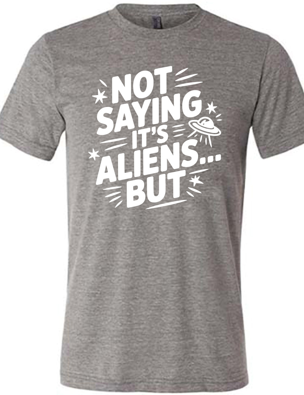 grey unisex tee with words, embellished by line graphics, saying "not saying it's aliens...but" with graphics of little stars and an alien spaceship