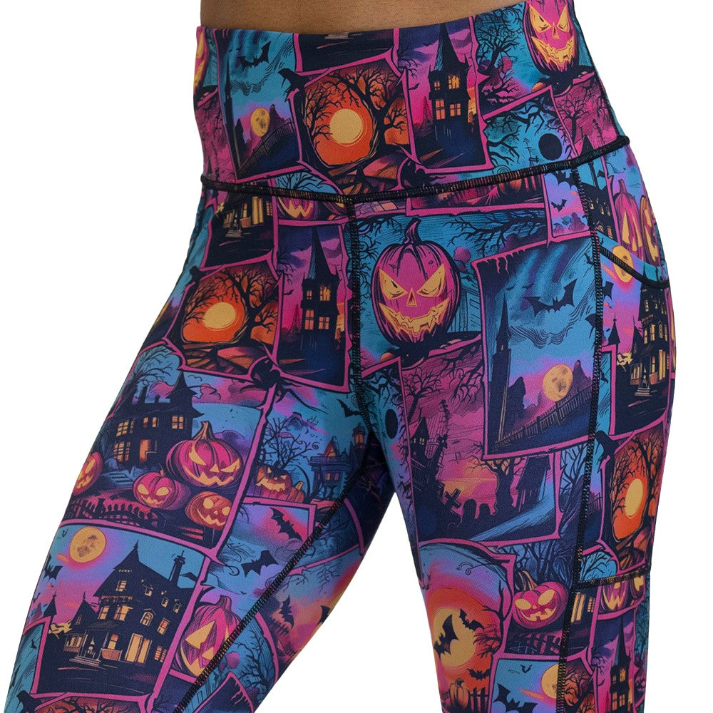 colorful Halloween-themed leggings with pumpkins, ghosts, and bats
