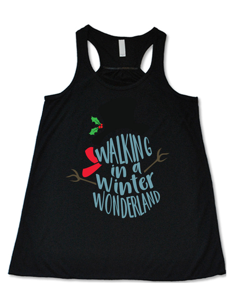 black flowy racerback tank with the words in the stacked shape of a snowman saying "walking in a winter wonderland" with the graphic completion of the snowman with stick arms, a red scarf, and a top hat with a holly branch accessory on it