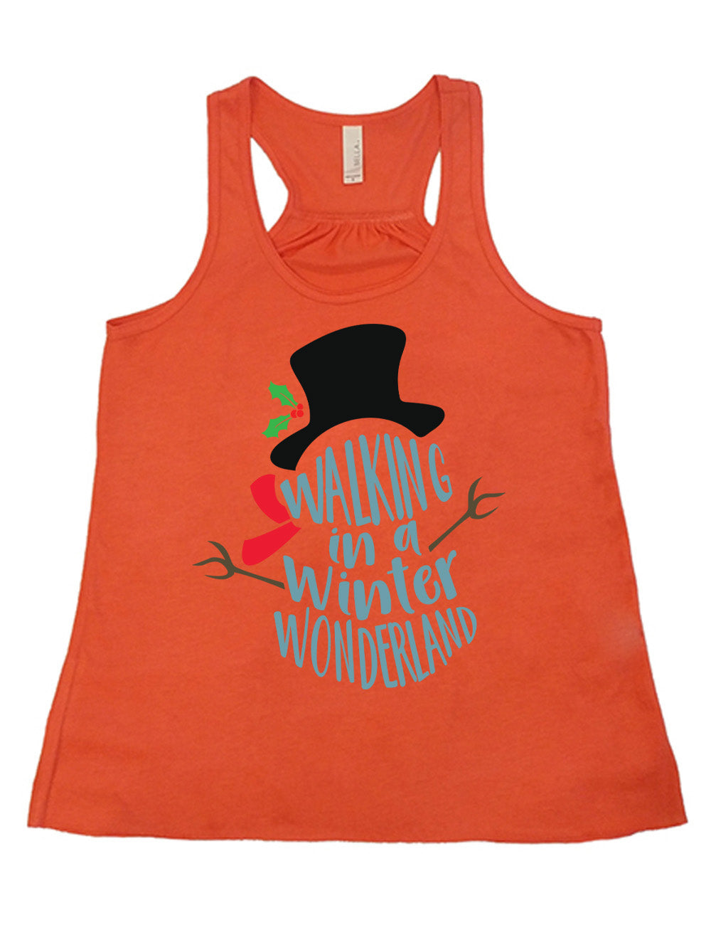 coral flowy racerback tank with the words in the stacked shape of a snowman saying "walking in a winter wonderland" with the graphic completion of the snowman with stick arms, a red scarf, and a top hat with a holly branch accessory on it