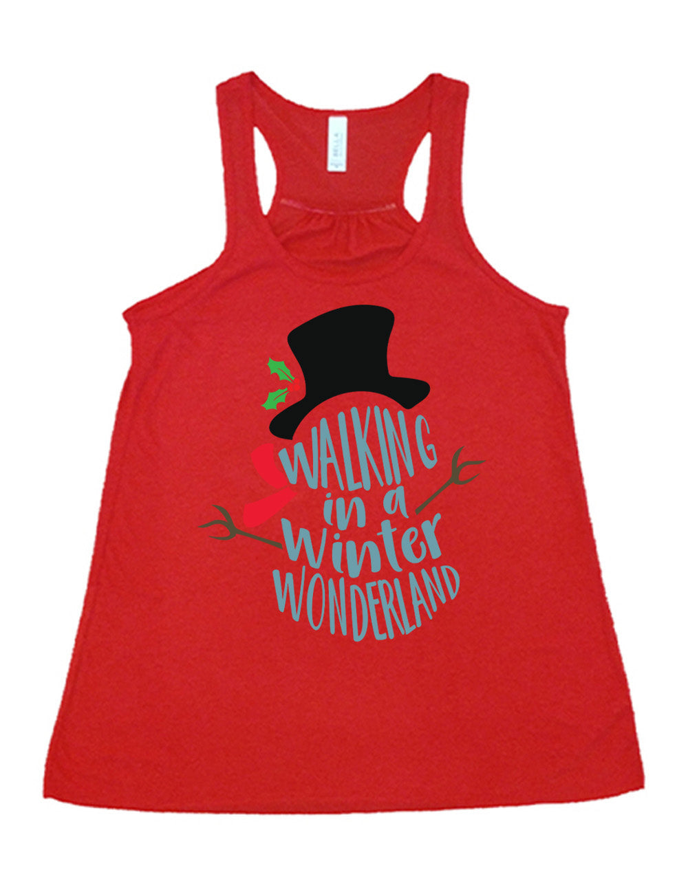 red flowy racerback tank with the words in the stacked shape of a snowman saying "walking in a winter wonderland" with the graphic completion of the snowman with stick arms, a red scarf, and a top hat with a holly branch accessory on it