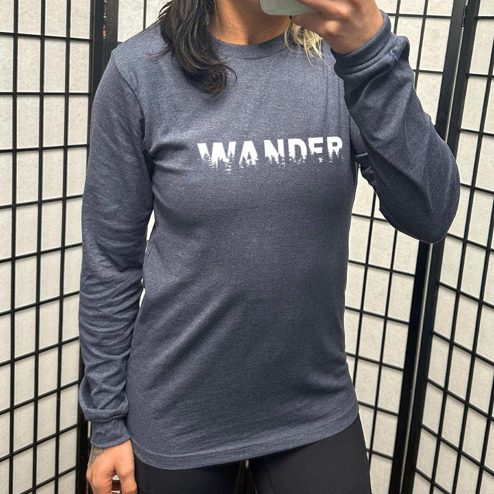 heather navy long sleeve shirt with a graphic on it that says "Wander"
