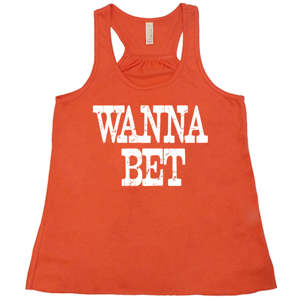 coral flowy tank with the words "wanna bet" in all capitals on it