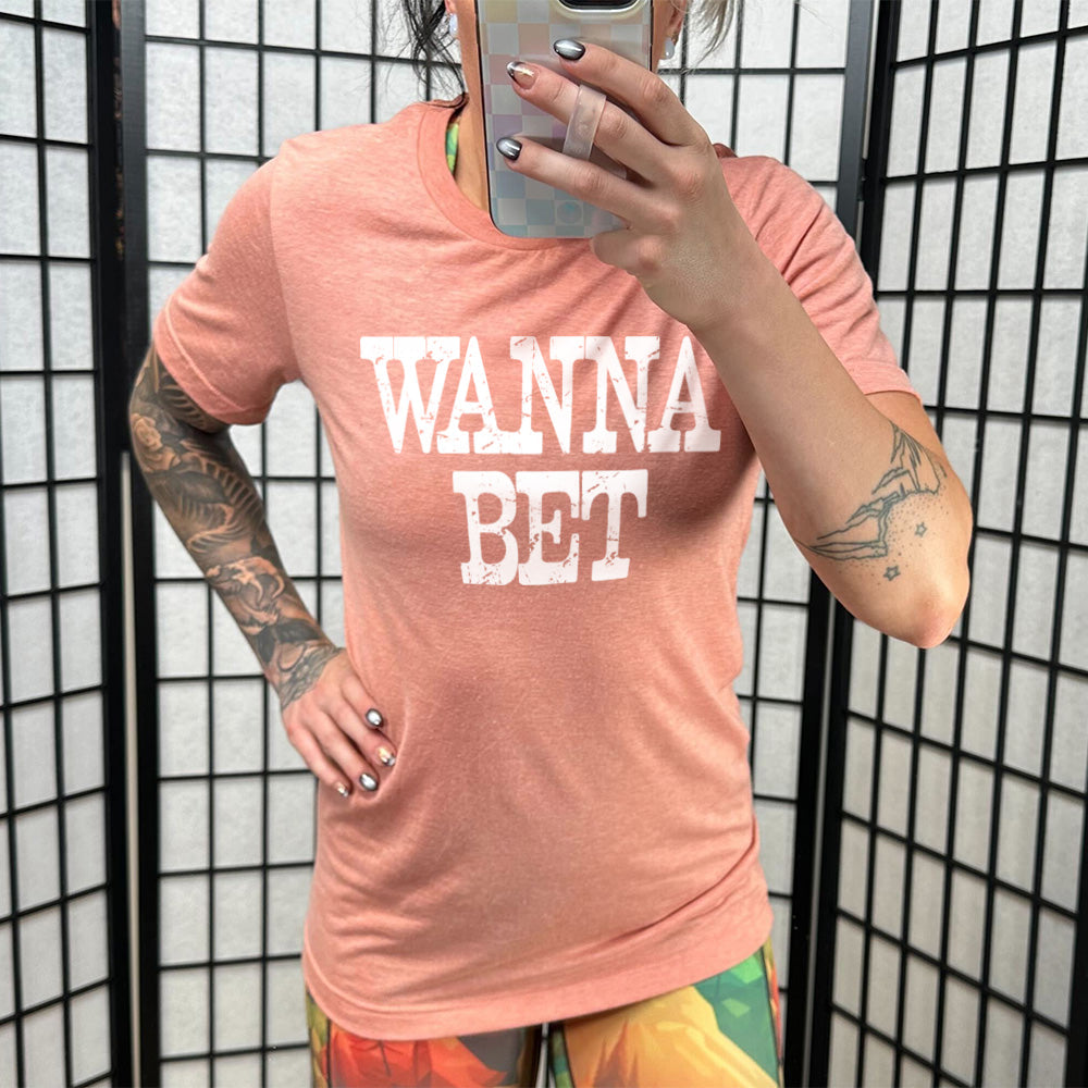 sunset unisex tee with the words "wanna bet" in all capitals on it