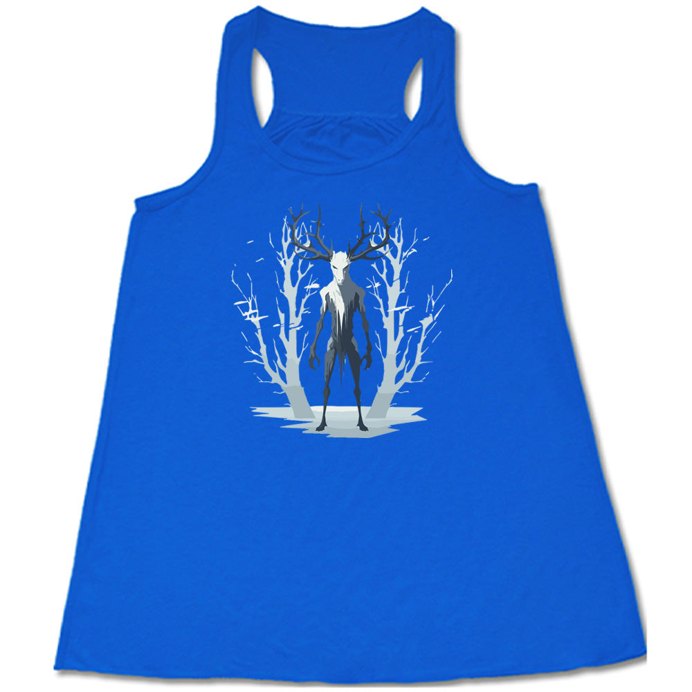 Blue colored flowy tank with wendigo in the woods graphic on it
