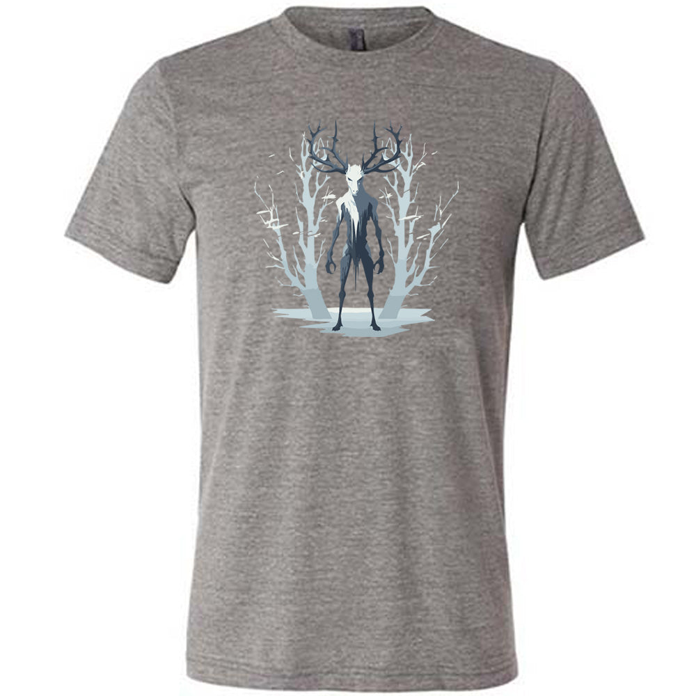 Grey colored shirt with wendigo in the woods graphic on it