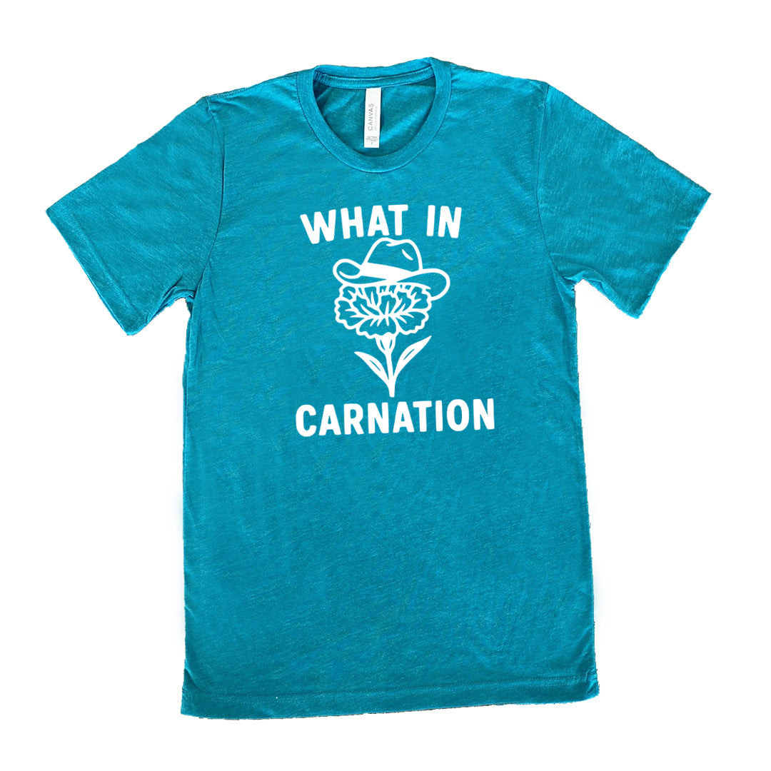 teal unisex tee with the words "What in carnation" on it, around the graphic of a carnation, wearing a cowboy hat