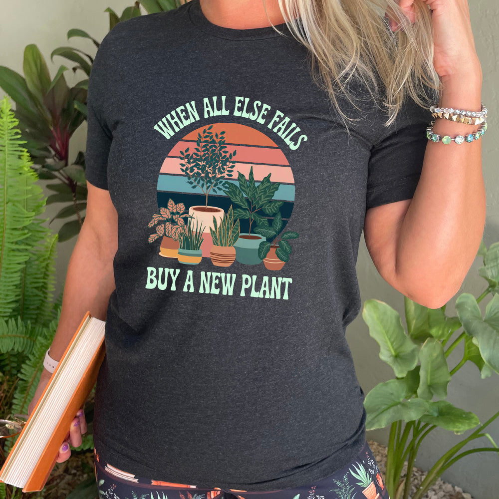 shirt with a potted plant graphic on it that says "When All Else Fails Buy A New Plant"