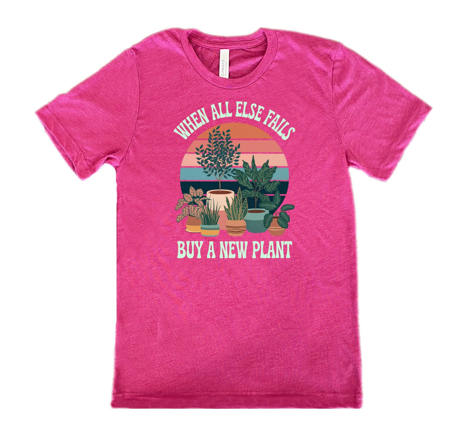 Berry colored shirt with a potted plant graphic on it that says "When All Else Fails Buy A New Plant"
