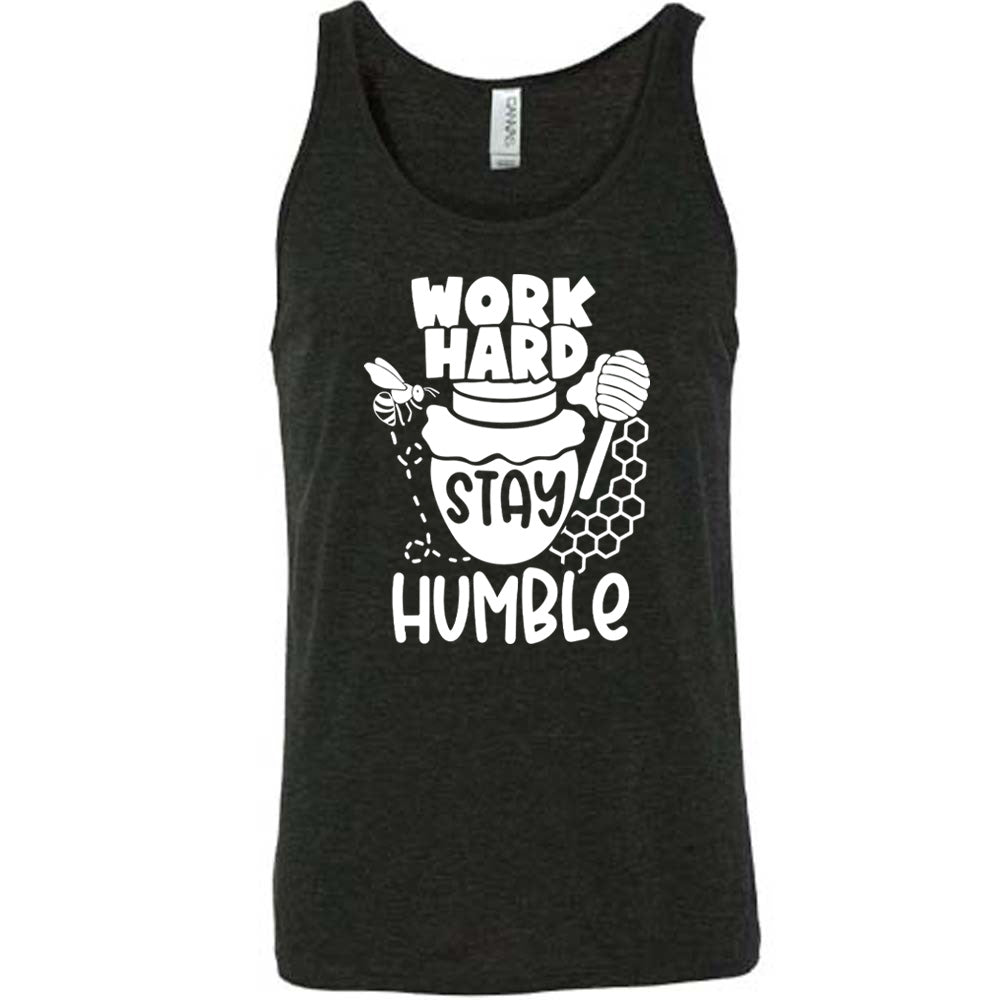 black unisex tank with the words "work hard stay humble" on it, with the word "stay" on the graphic of a honeypot, and a bee flying around the pot's left, and some honeycomb and a honey spoon on its right