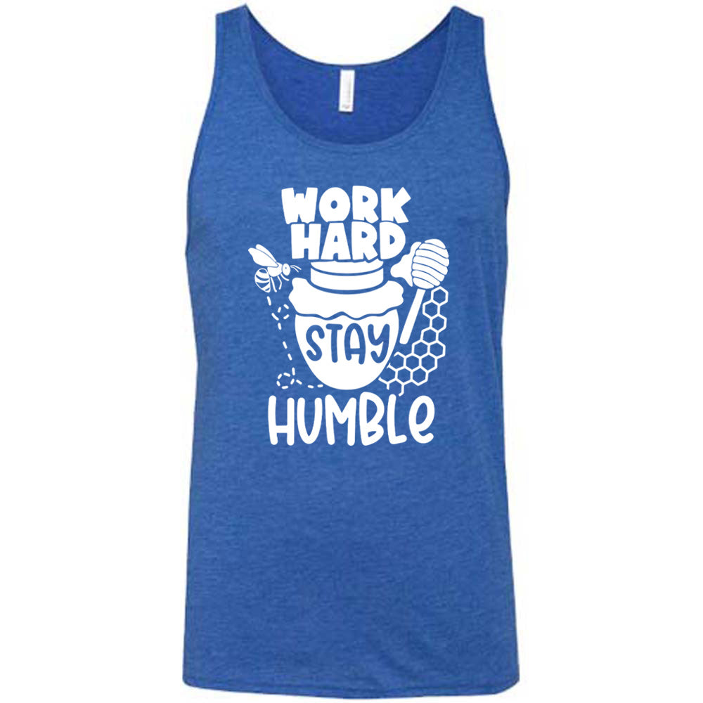 blue unisex tank with the words "work hard stay humble" on it, with the word "stay" on the graphic of a honeypot, and a bee flying around the pot's left, and some honeycomb and a honey spoon on its right