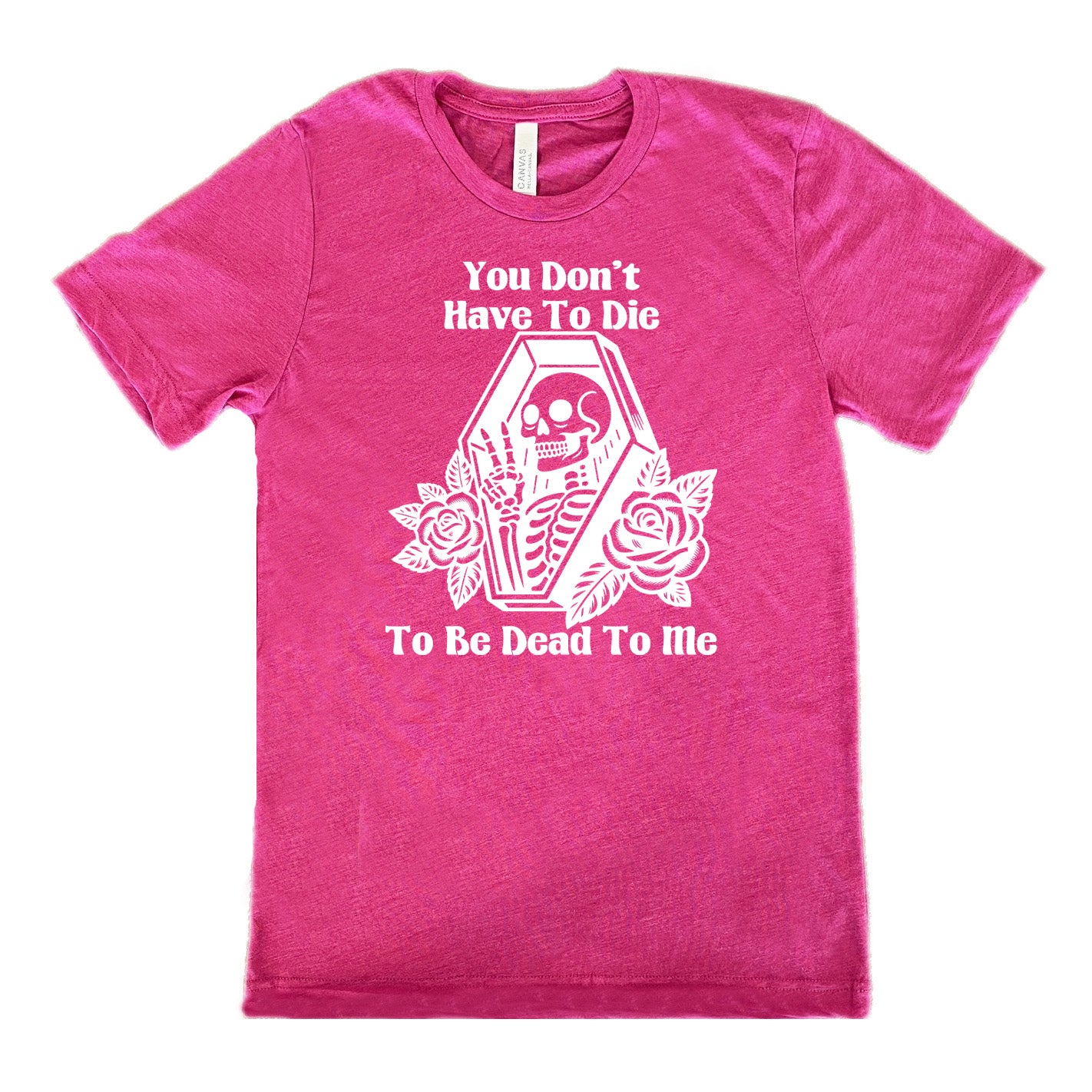 berry unisex tee with the words "You don't have to die to be dead to me" on it with the graphic of a a skeleton in a coffin, giving the peace sign, with two flowers on either side of the coffin