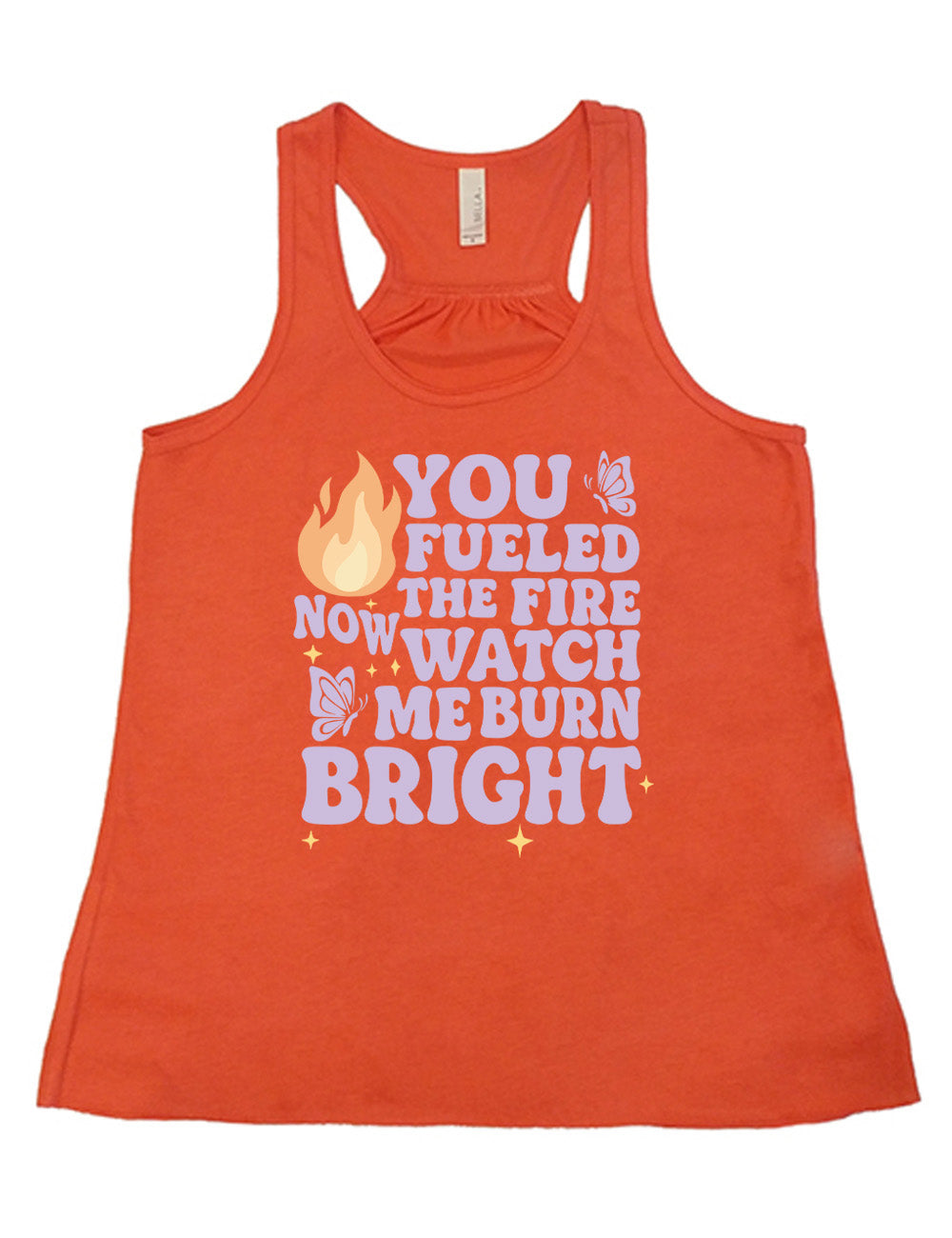 coral flowy racerback tank with the words "You Fueled The Fire Now Watch Me Burn Bright" on it, with the graphic of a flame, two butterflies, and a few little stars