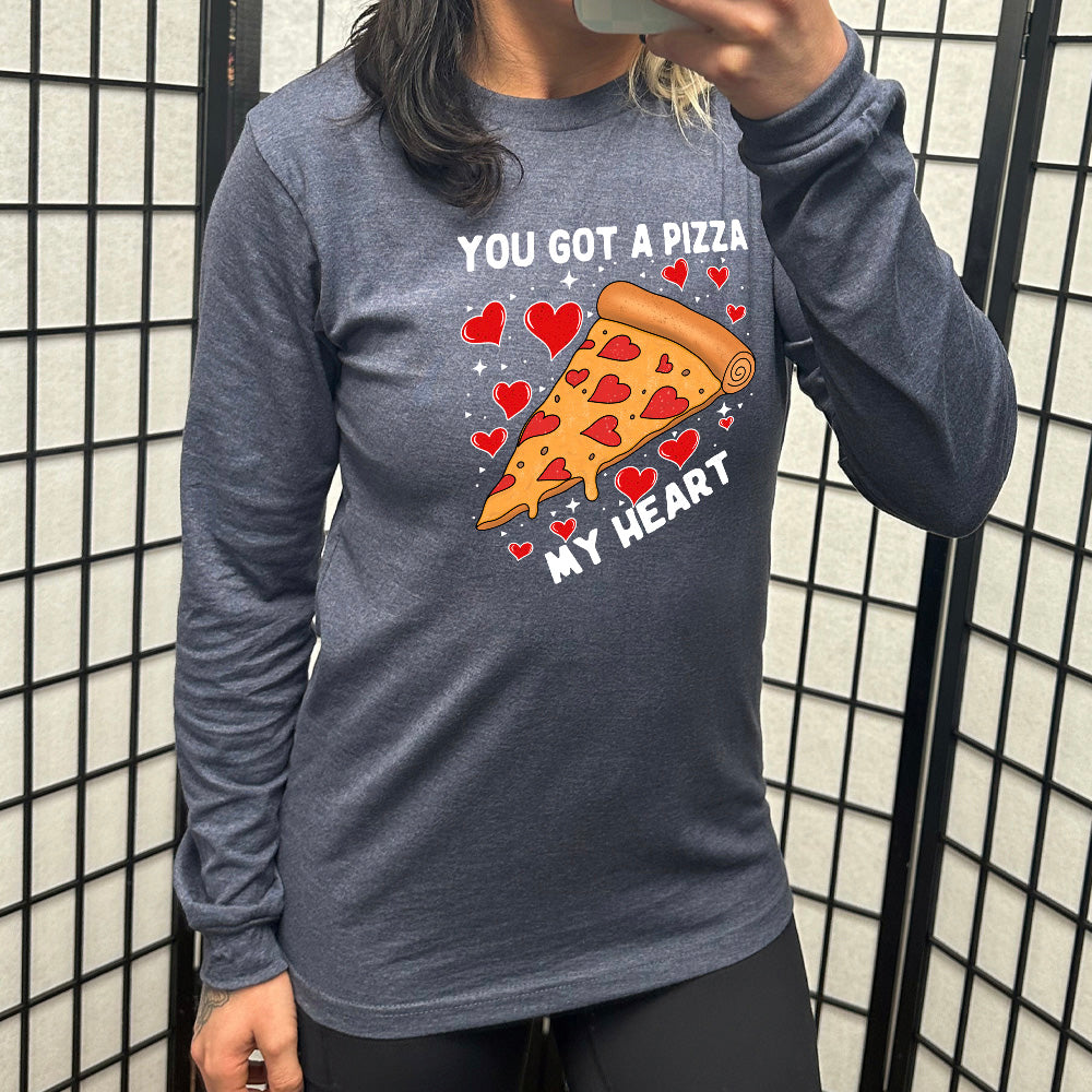 heather navy long sleeve shirt with the words "you got a pizza my heart" on it, with a big graphic of a pizza with pepperoni hearts, and hearts surrounding it as well with little stars