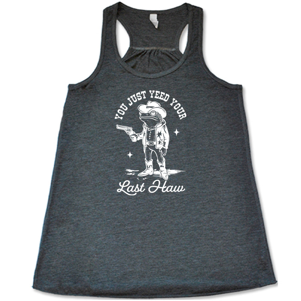 Grey colored flowy tank with a cowboy frog graphic on it that says "You Just Yee'd Your Last Haw"
