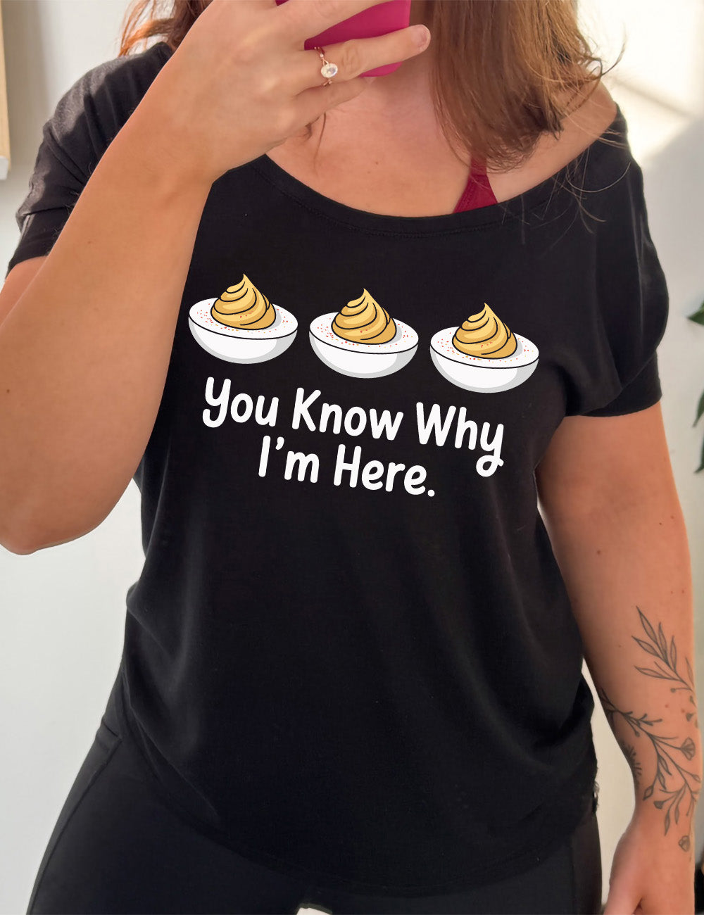 black slouchy tee with the words "you know why I'm here" underneath the graphic of three deviled eggs