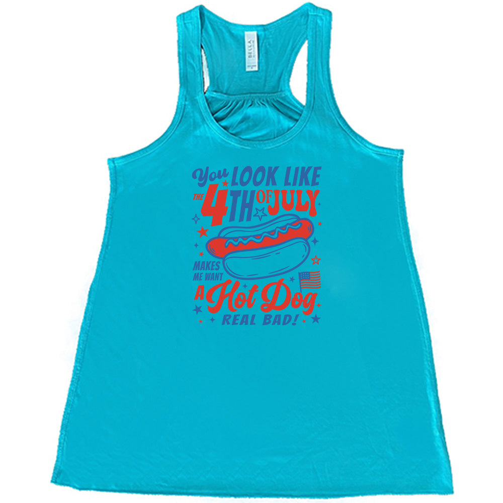 Teal colored flowy tank with a hot dog graphic on it that says "You Look Like the 4th of July Makes Me Want A Hot Dog Real Bad"