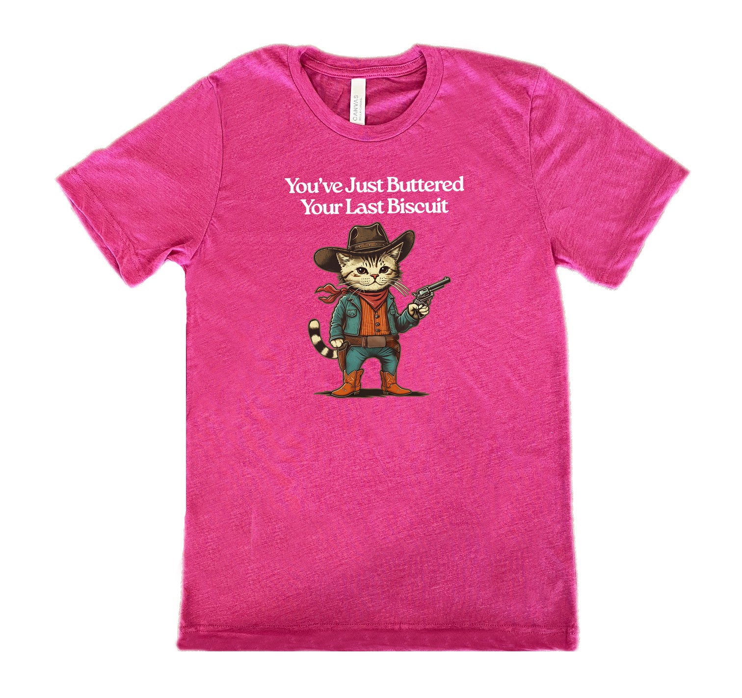 Berry colored shirt with a cowboy cat graphic on it that says "You've Just Buttered Your Last Biscuit"