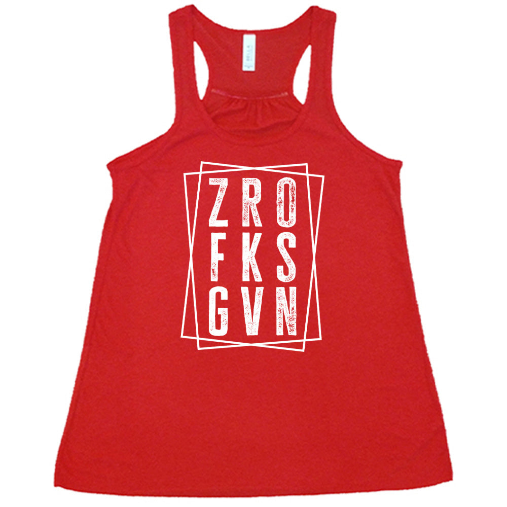 Red colored flowy tank with a graphic on it that says "ZRO FKS GVN"
