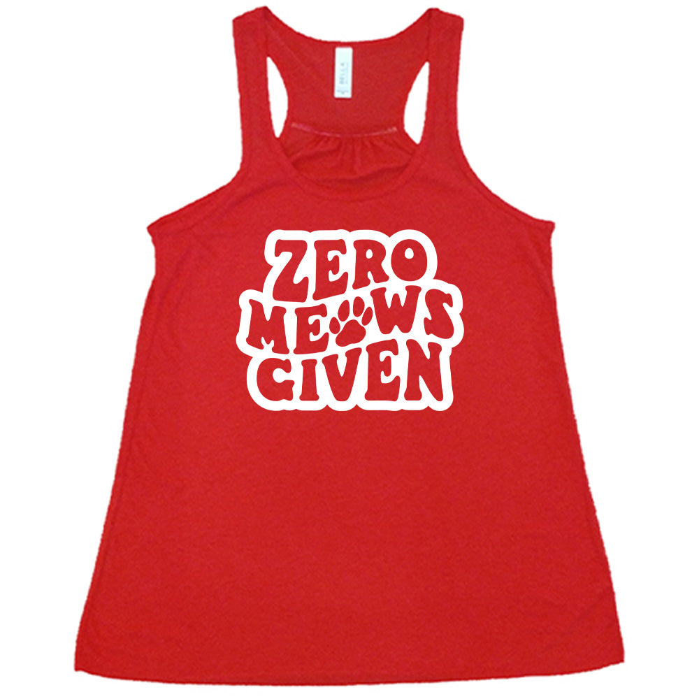 Red colored flowy tank with paw print graphic on it that says "Zero Meows Given"