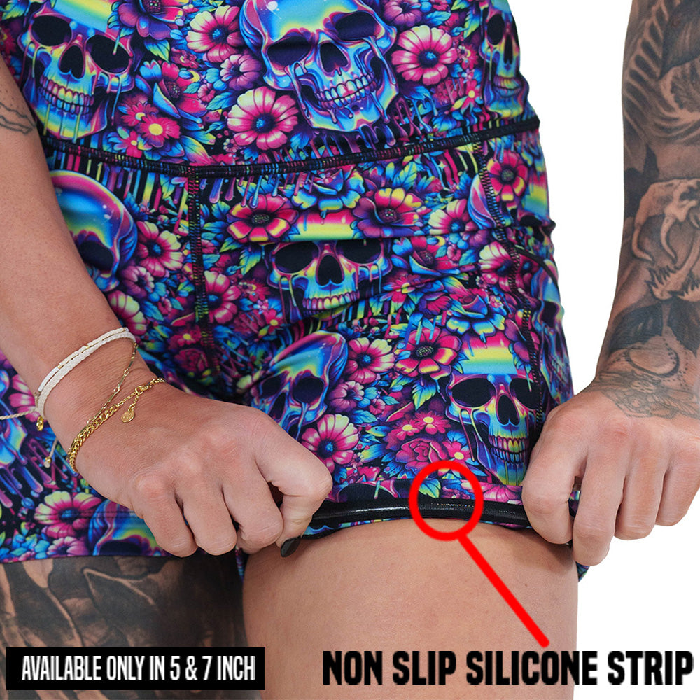 neon skull print shorts rolled up to show the non slick silicone strip that is available in the 5 and 7 inch inseam lengths