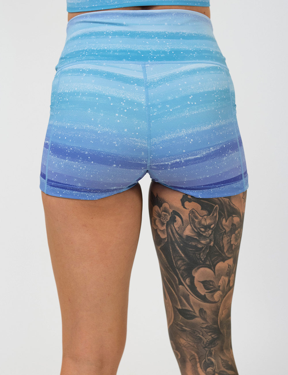 back of the 2.5 inch blue and white ombre shorts against a white background