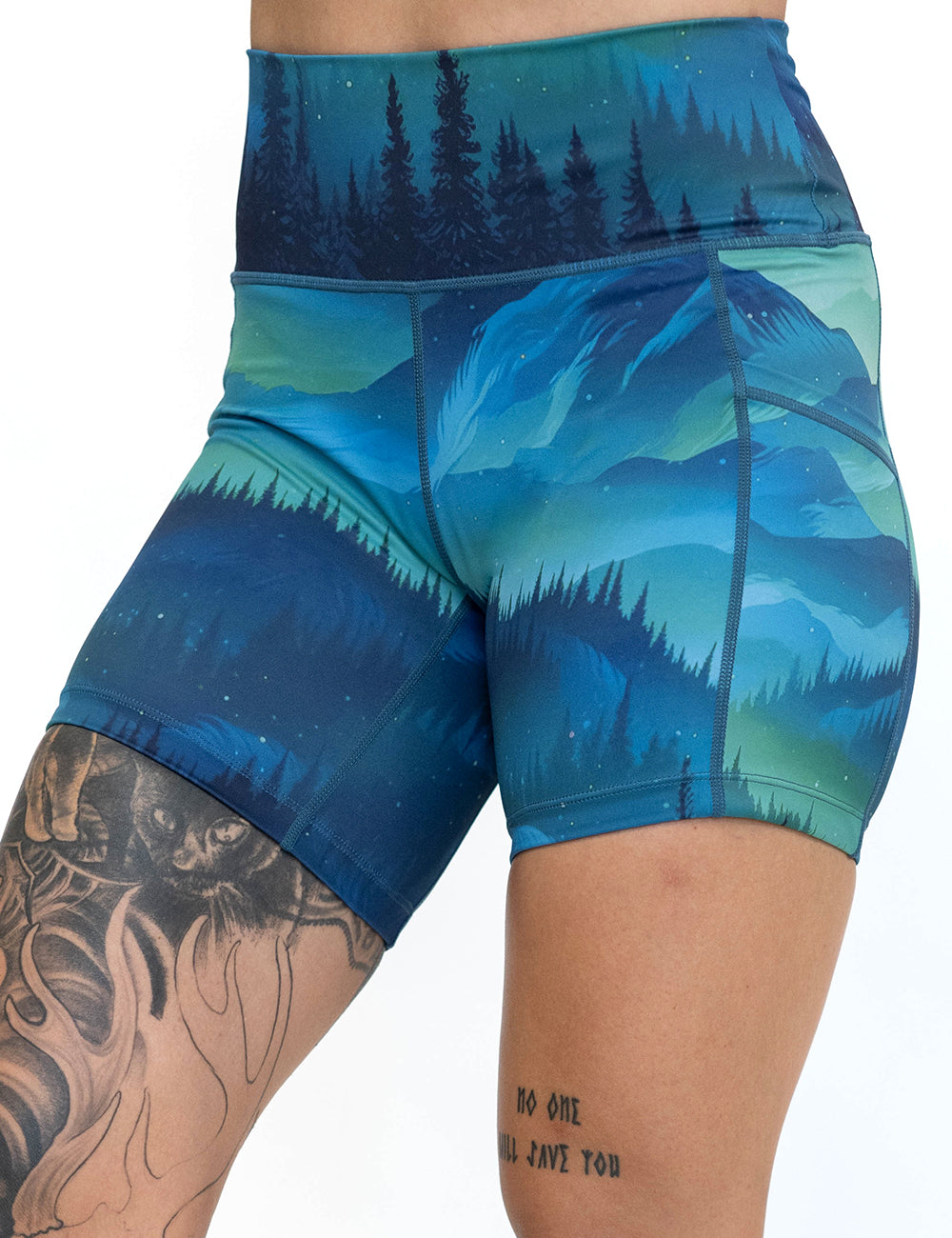 front of the wilderness aurora 5 inch shorts against a white background