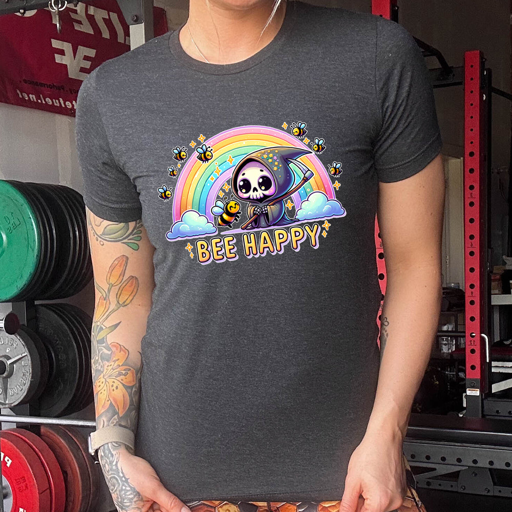 Black colored shirt with a grim reaper & bee in front of a rainbow graphic on it that says "Bee Happy"