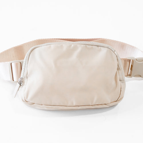 front of beige belt bag