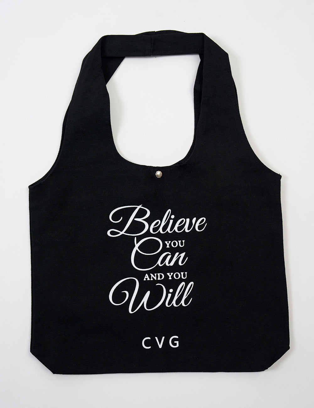 Black tote bag with the CVG logo and the large words "believe you can and you will" on it
