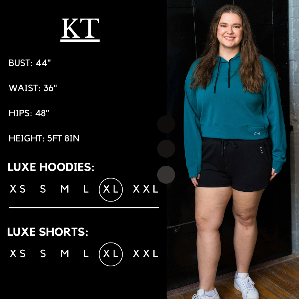 Model’s measurements of 44” bust, 36” waist, 48” hips and height of 5 ft 8 in. She is wearing a size x-large in our luxe shorts
