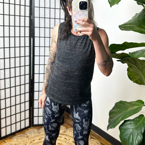 model wearing black marble tank top