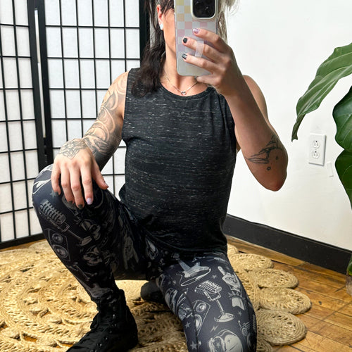 model wearing black marble tank top