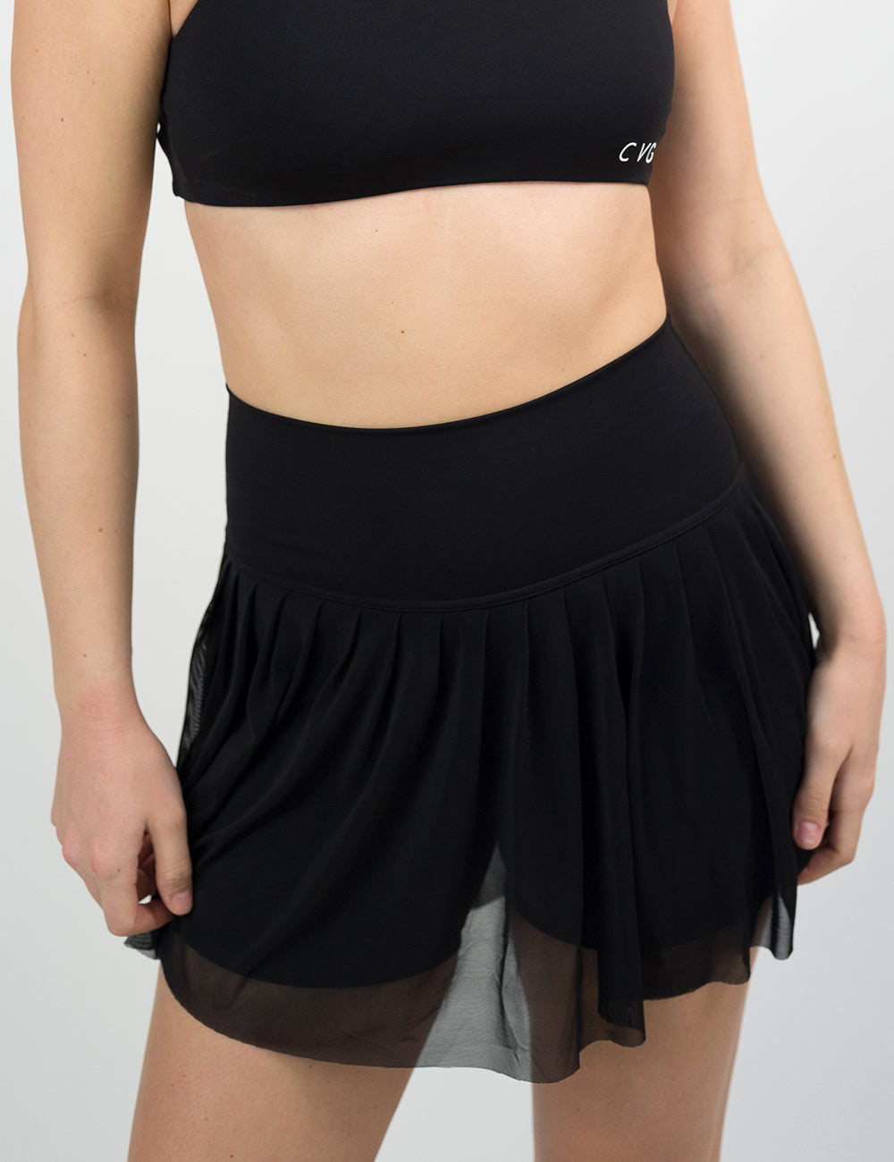 front of the sheer black motion skirt against a white background
