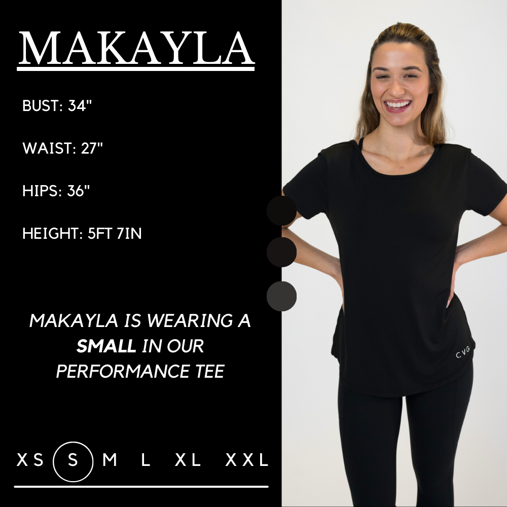 Model’s measurements of 34” bust, 27” waist, 36” hips and height of 5 ft 7 in. She is wearing a size small in our performance tee