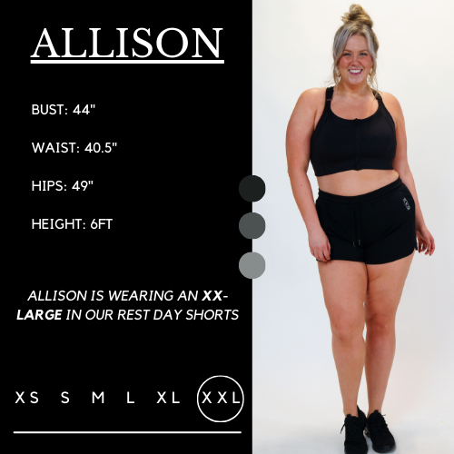 Model's measurements of 45 inch bust, 40.5 inch waist, 51 inch hips, and height of 6 foot. She is wearing a size double extra large in these shorts