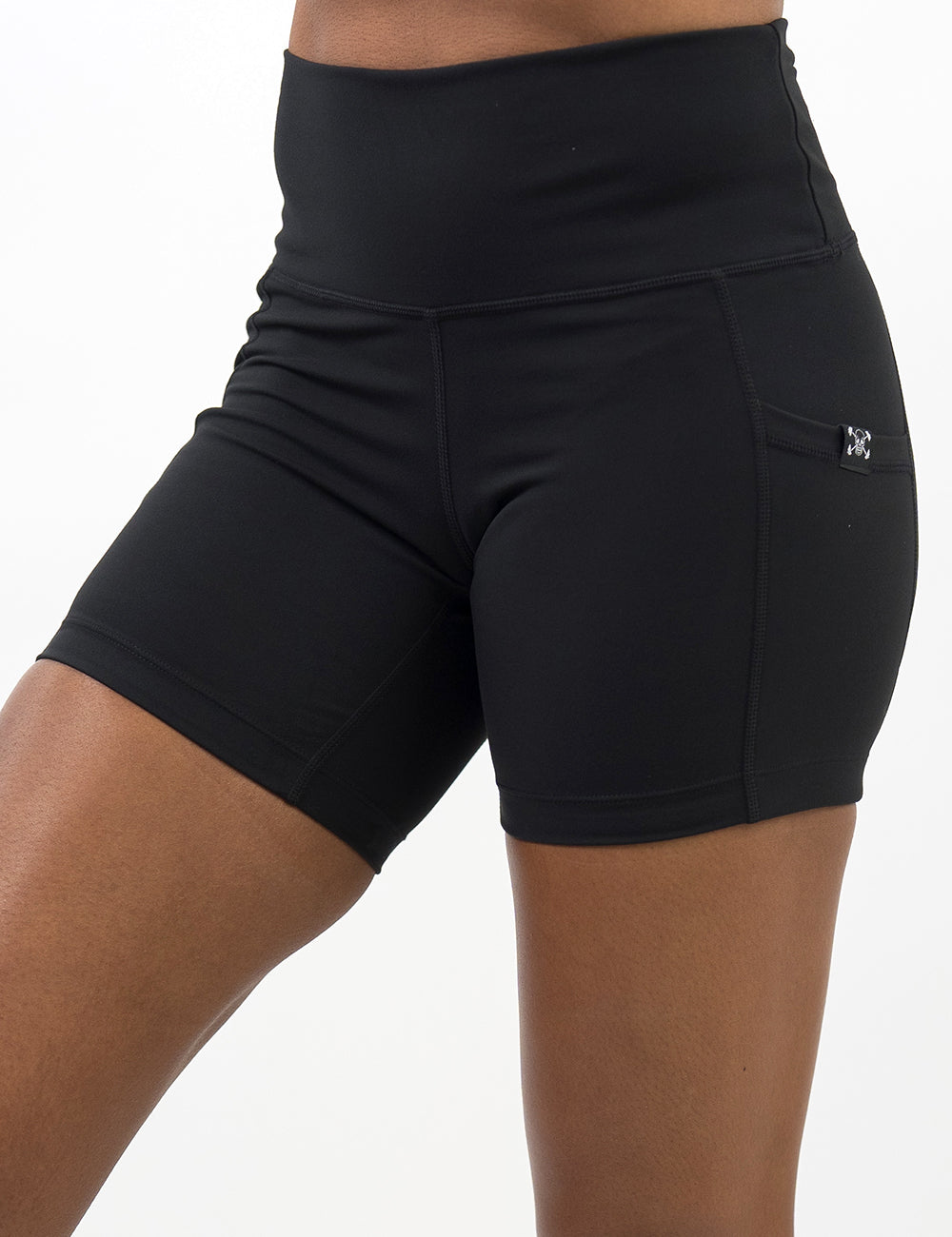 front of the solid black 5 inch shorts against a white background
