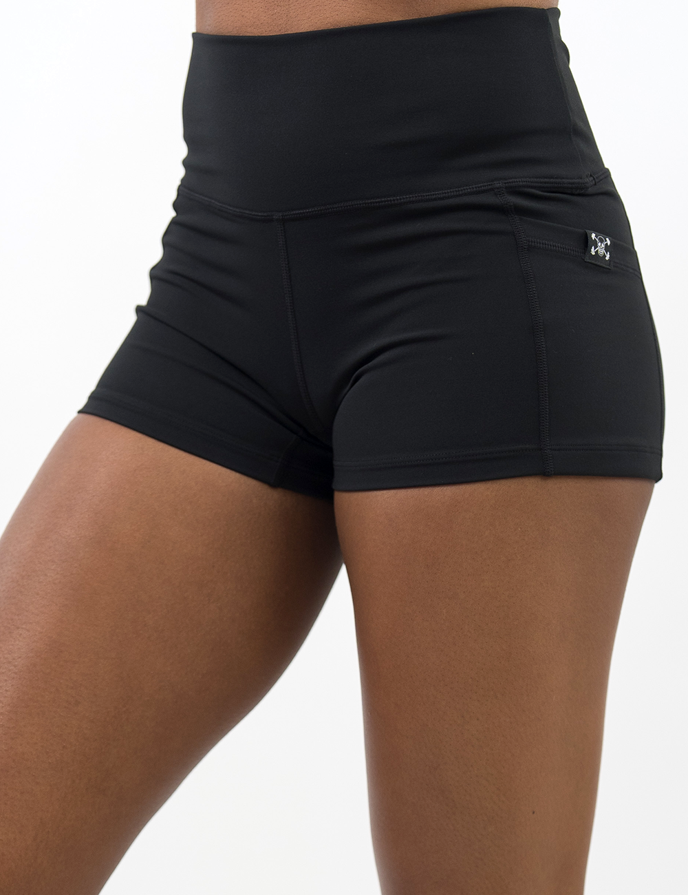 front of the solid black 2.5 inch shorts, with a cvg logo on the pocket against a white background